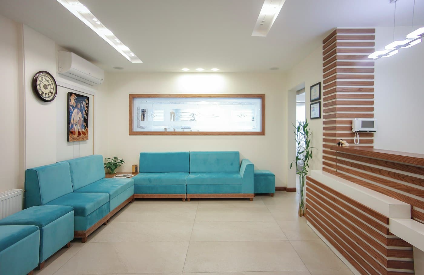 Calm waiting area with teal sofas