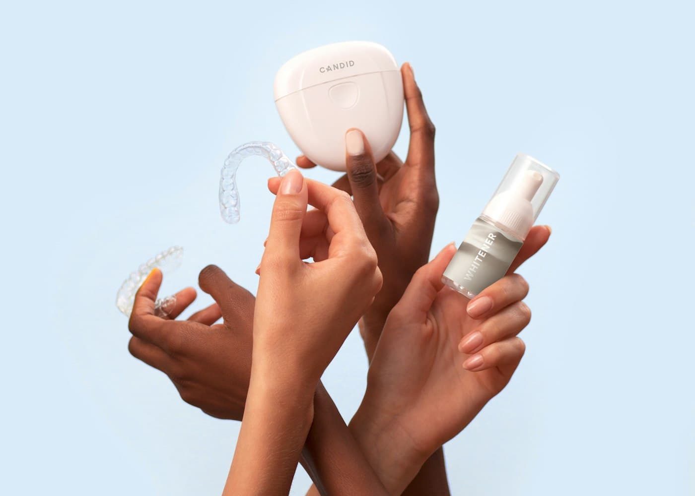 Clear aligners held in a hand