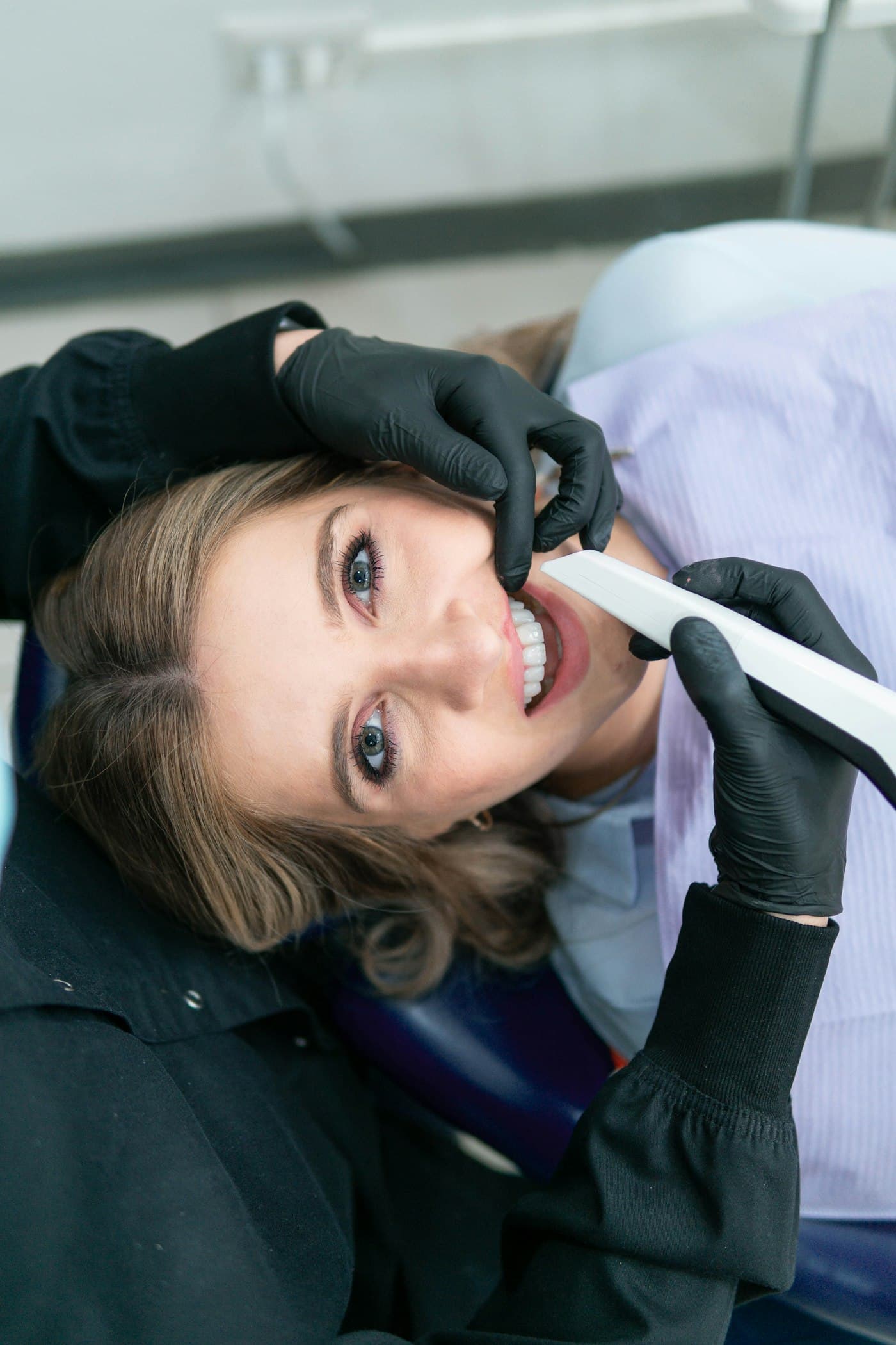 Dentist showing a patient their scan